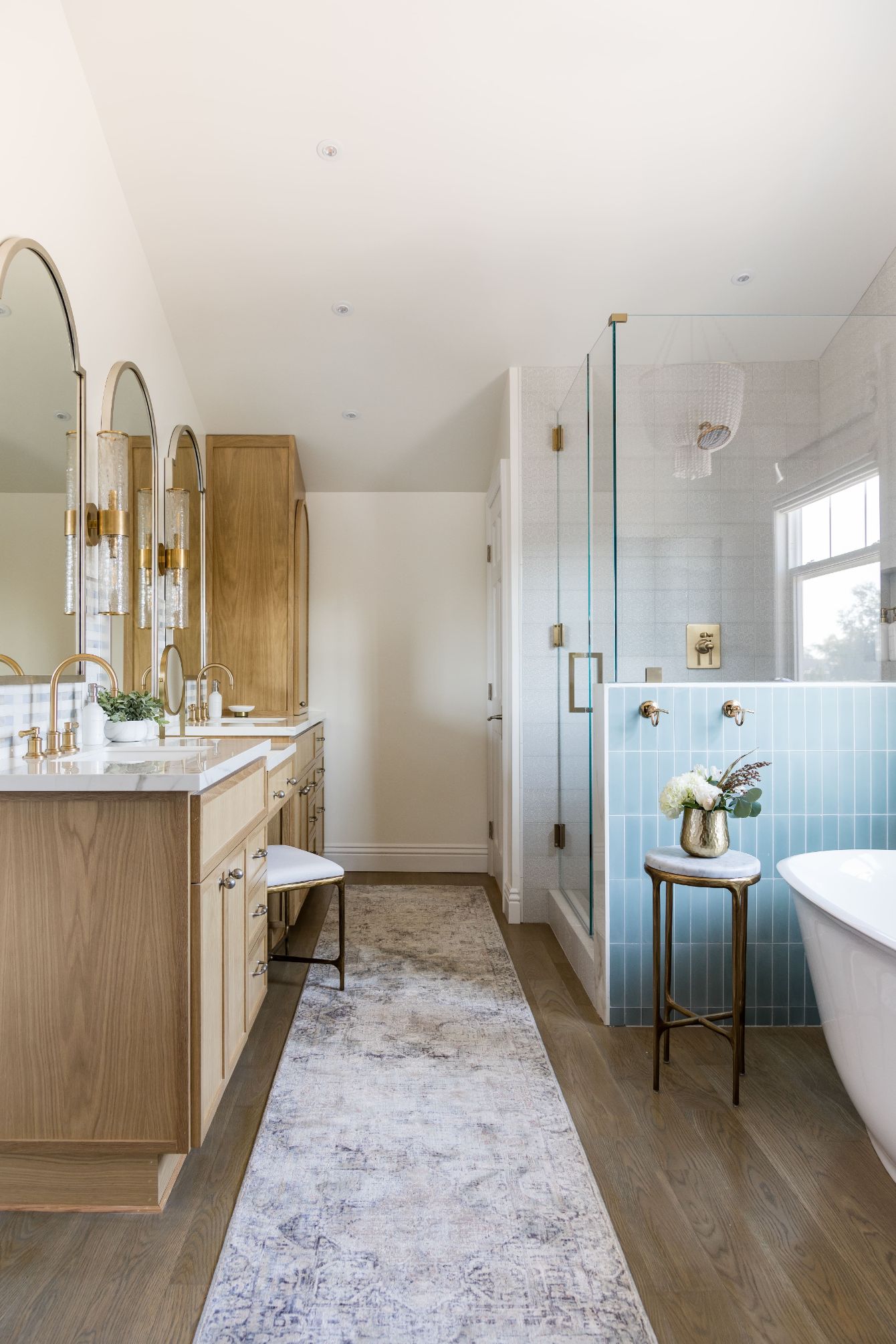 bright modern bathroom design with frameless shower