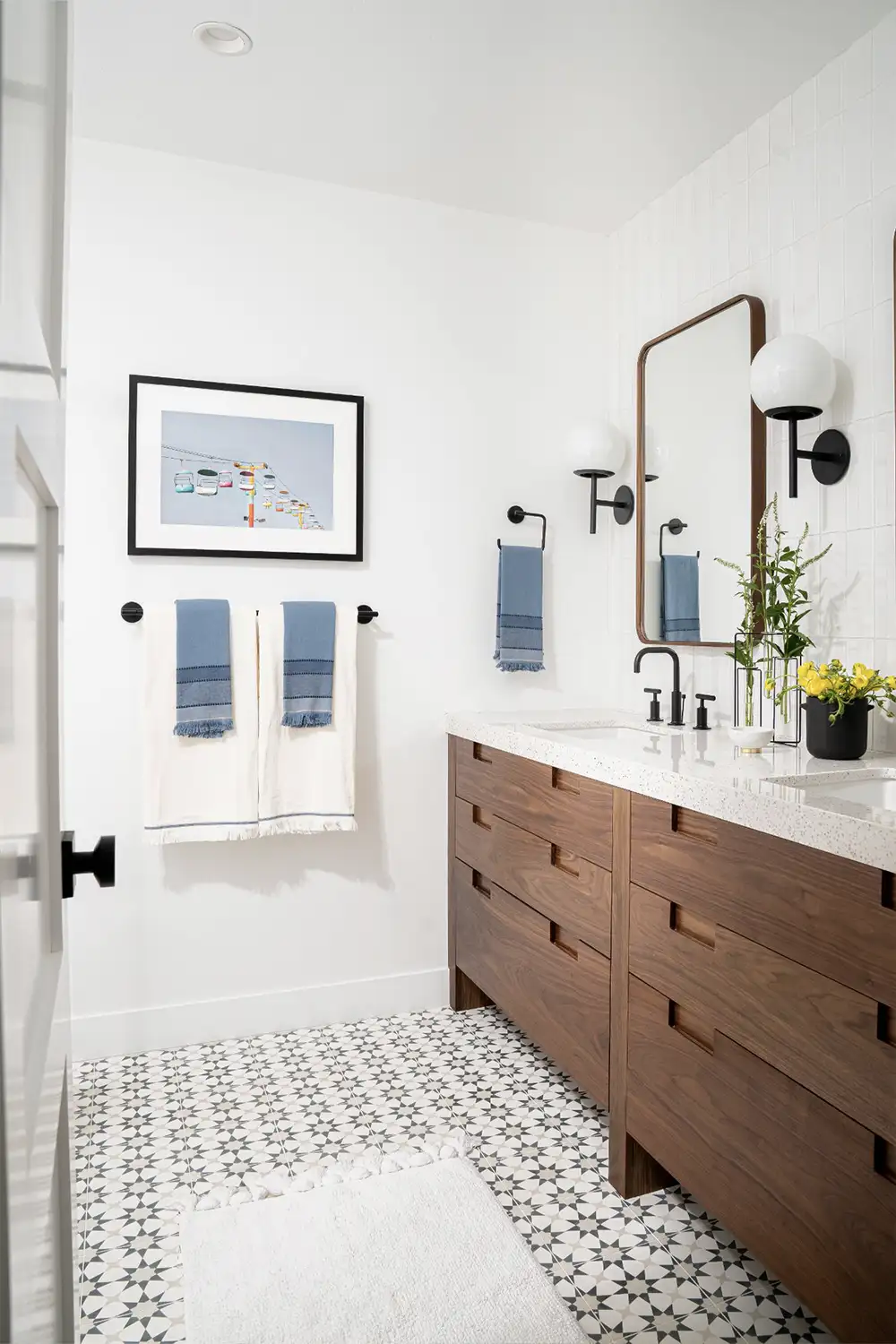 Villa Park Bathroom Design with patterned tile, wood vanity and black fixtures