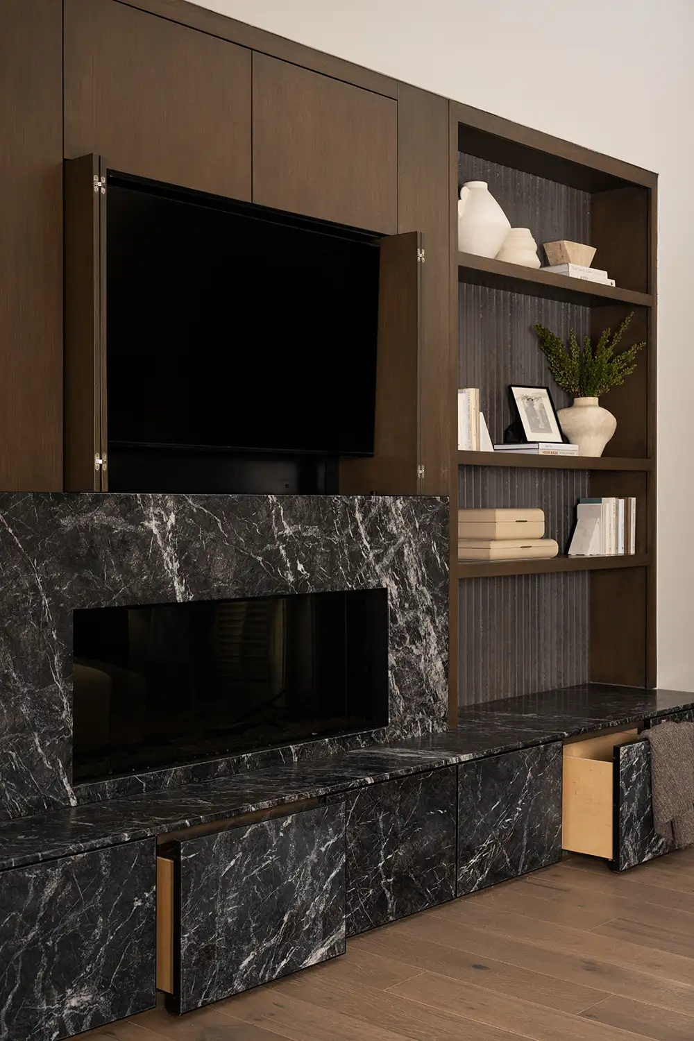 unique fireplace and custom cabinetry interior design